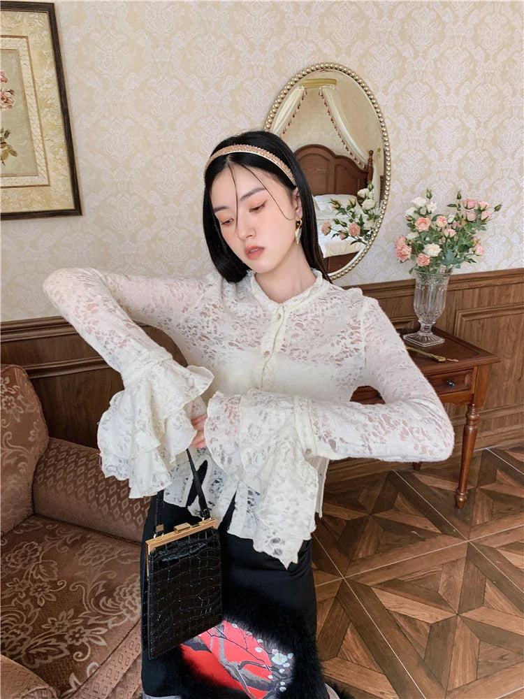 Lace patchwork shirt with ruffled sleeves in a beige color, perfect for casual and formal occasions