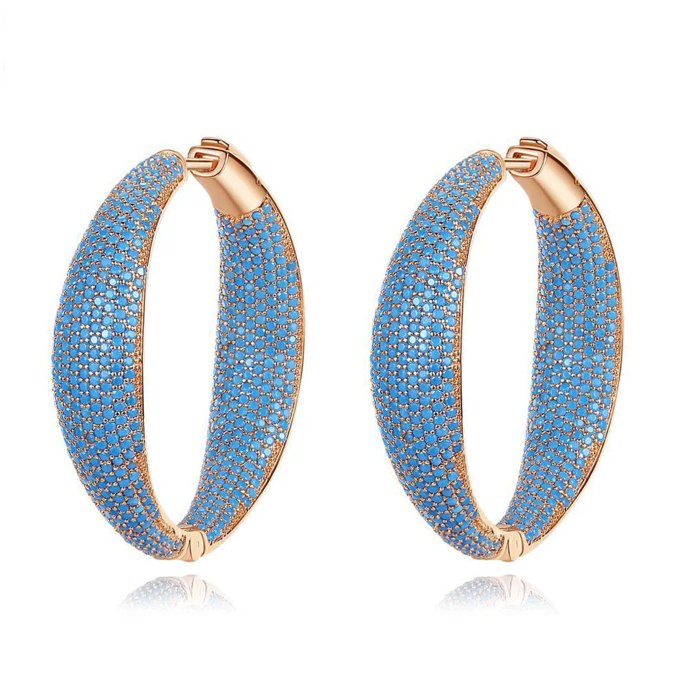 Elegant Blue Dream Ear Rings with a crown-inspired design and shimmering zircon stones