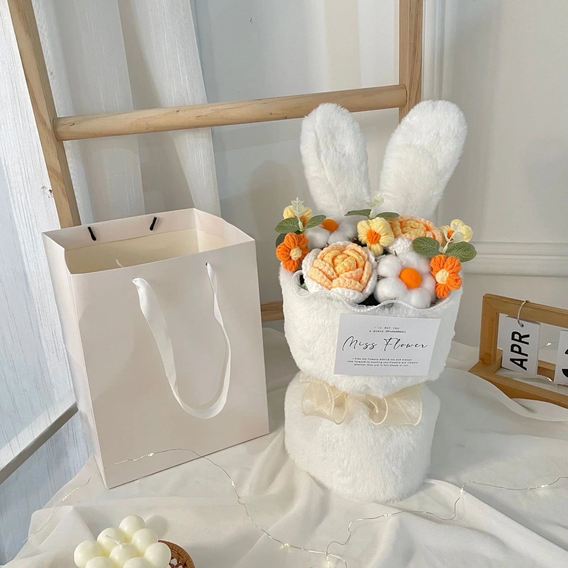 Creative knitted rabbit ear bouquet doll in vibrant colours, a unique and eco-friendly home accessory from New Zealand