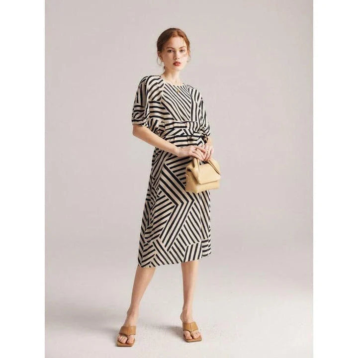 Elegant striped dress made from luxurious Mulberry silk with batwing sleeves, perfect for Kiwi women's fashion.