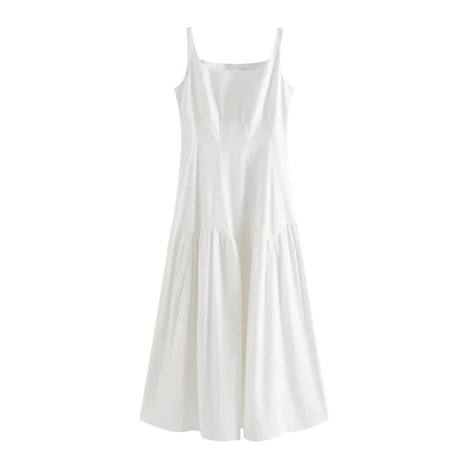 A French-inspired white suspender long dress made of 100% premium cotton for effortless elegance and all-day comfort.