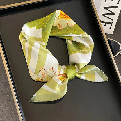 Elegant pure silk square scarf in a lush green color, perfect for adding a touch of sophistication to any Kiwi's wardrobe