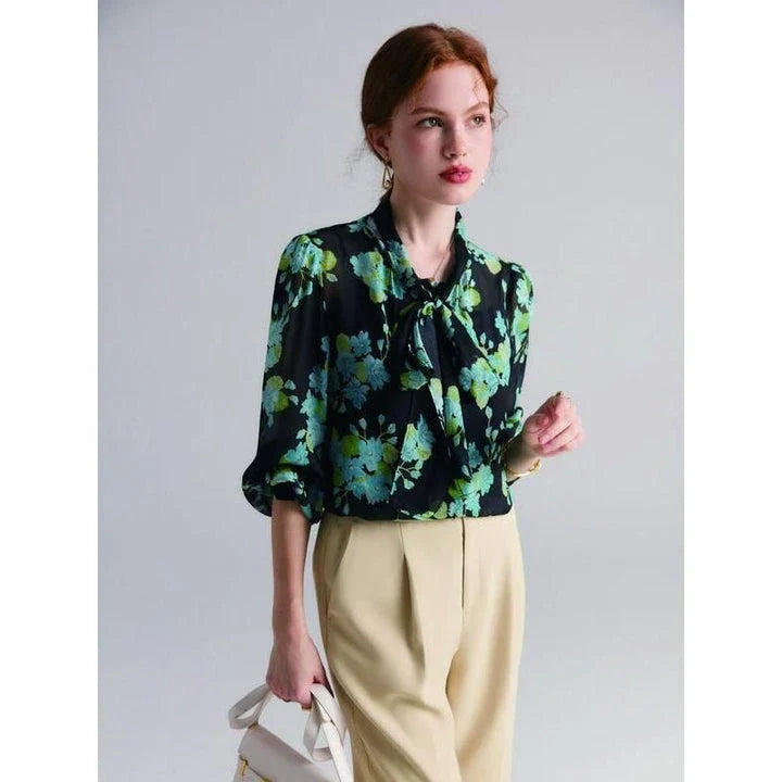 Elegant floral silk blend blouse with puff sleeves and bow collar, a timeless fashion statement for Kiwi women