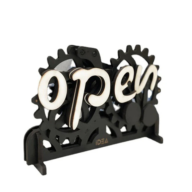 Charming open/closed sign with manual gear mechanism, made of New Zealand pine wood with Kiwiana-inspired design