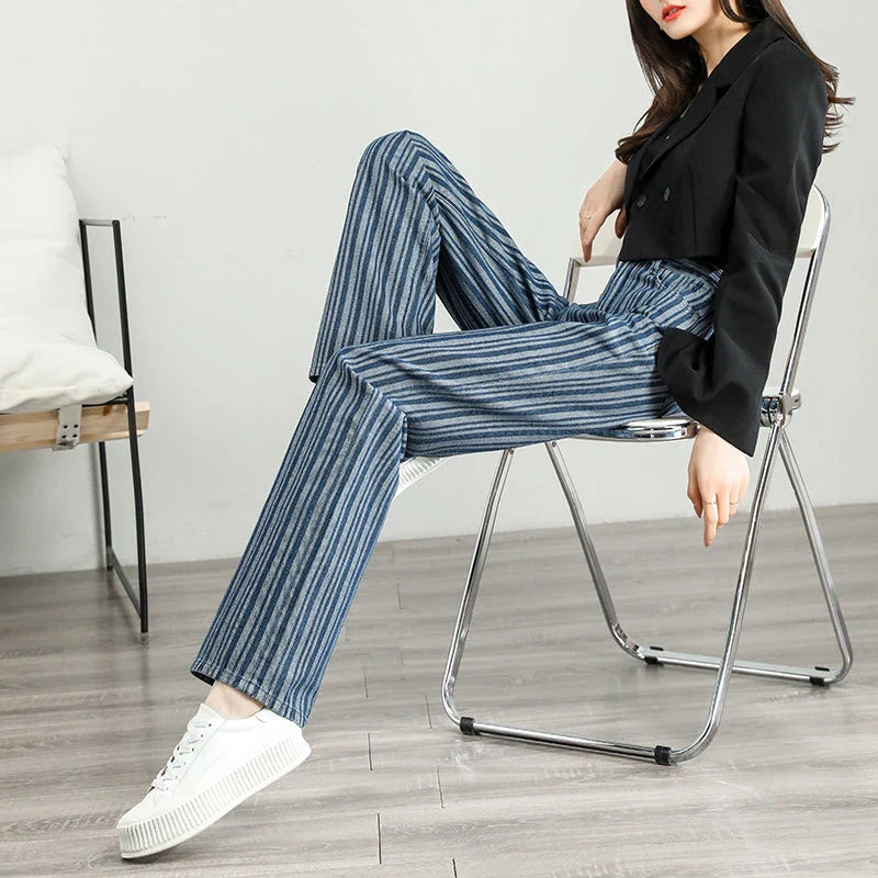 Fashionable striped wide-leg jeans for Kiwi women, featuring a high-waist design, premium cotton-viscose blend, and unique wash treatments.