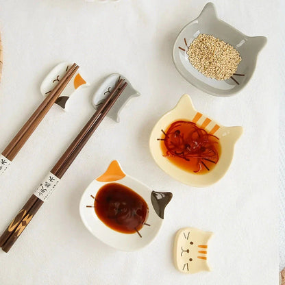 Charming Japanese-style ceramic condiment dish with a playful cat design, perfect for serving sauces, dips, and small snacks.