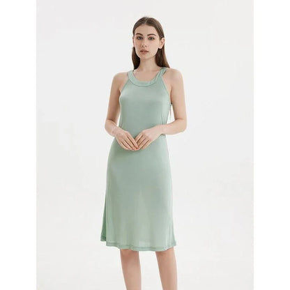 Elegant silk-blend halter midi dress in green and white, perfect for Kiwi women's summer fashion
