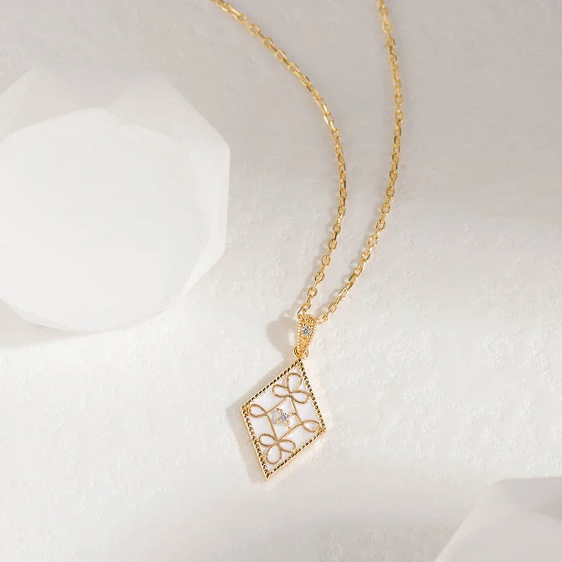 Premium 925 sterling silver retro geometric pendant necklace with oil-dripping treatment, available in black and white colors