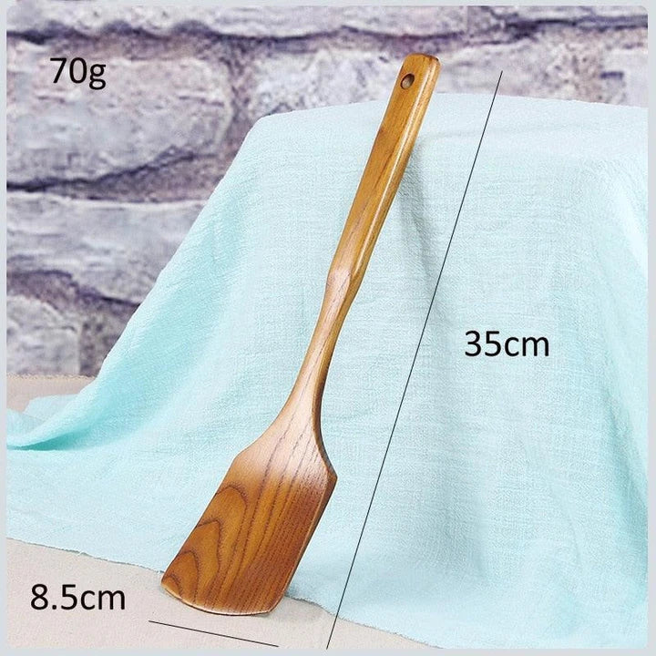 Versatile Wooden Turner - a high-quality, long-handled kitchen tool made from sustainable New Zealand timber for flipping, tossing, and maneuvering food with ease.