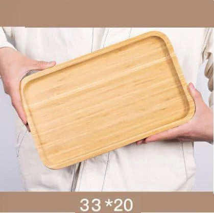 A beautiful, natural bamboo serving tray with a warm brown hue, perfect for hosting and organizing in any Kiwi kitchen.