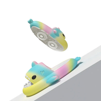 Gradient rainbow shark-patterned slippers with a comfortable EVA sole and durable PVC upper, available in a range of vibrant colours