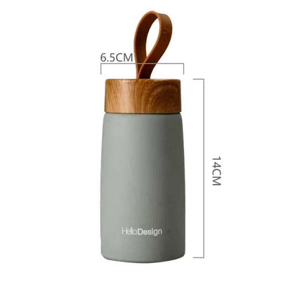 Compact and insulated mini coffee mug in pink color, featuring durable stainless steel construction and leak-proof lid for Kiwis on the go