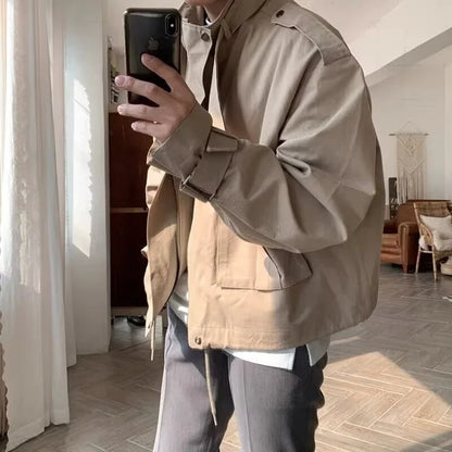 A stylish vintage-inspired jacket with an overalls-inspired design, featuring a lightly mature aesthetic and premium construction.