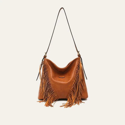 Elegant vegan leather shoulder bag with stylish tassel fringe in black color