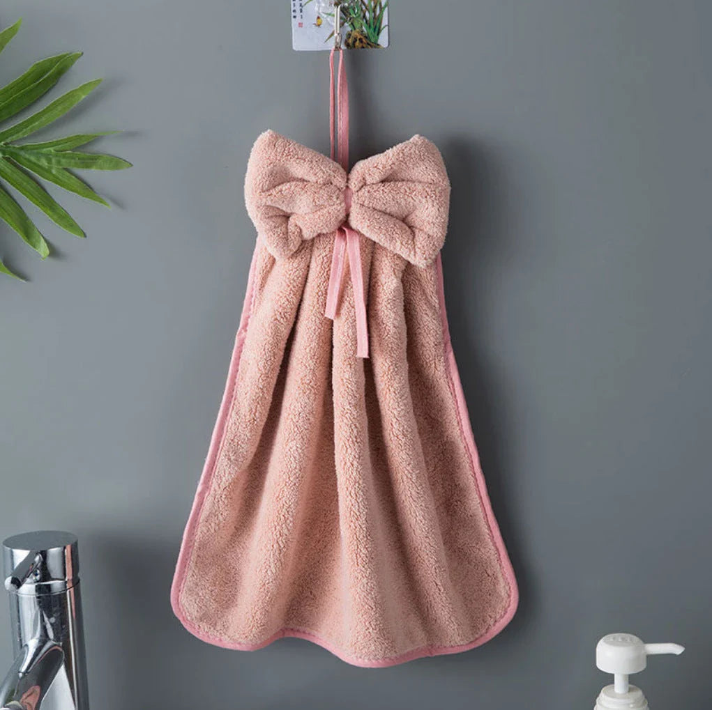 Soft, absorbent coral velvet hand towels with a unique bow design, perfect for Kiwi homes