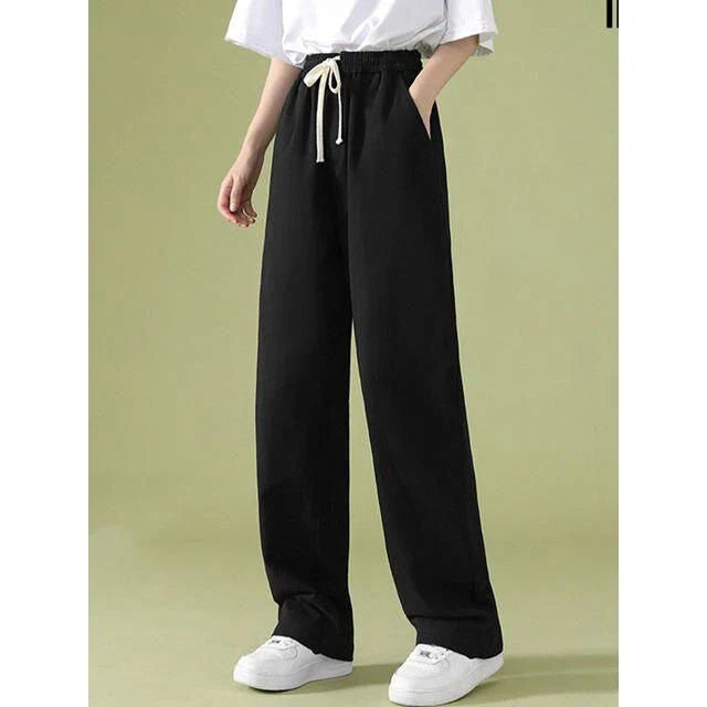 Elegant high waist wide leg pants in a versatile white color, perfect for the modern Kiwi woman's wardrobe.