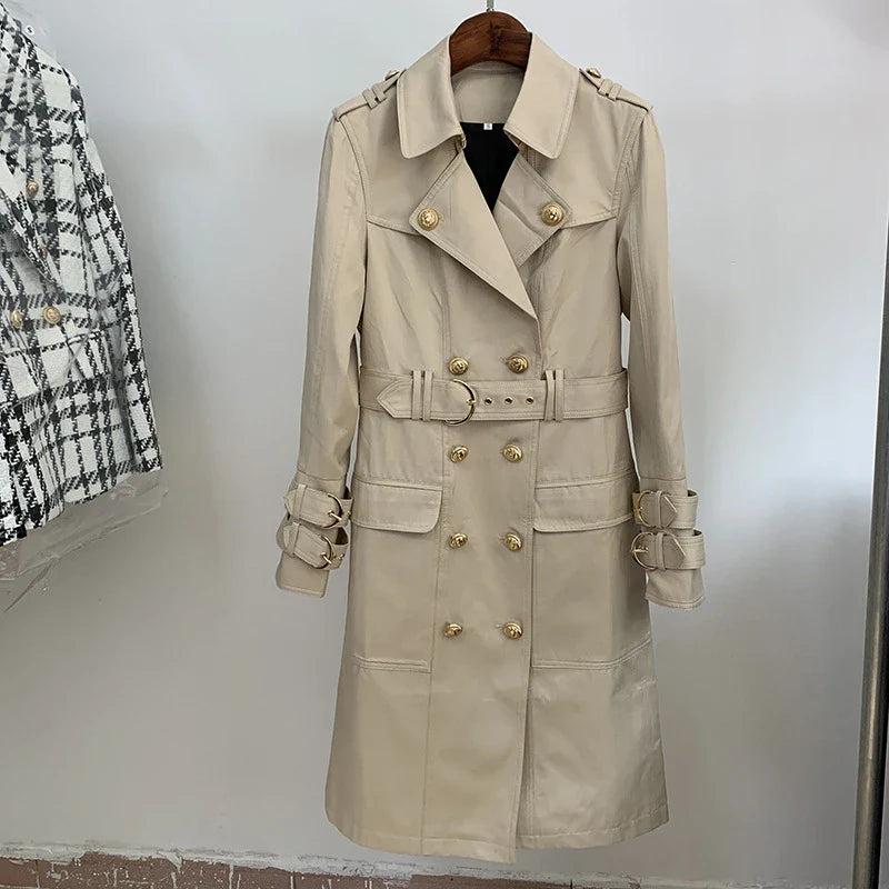 A stylish double-breasted trench coat with a belted waist, made from a cotton-polyester blend for durability and comfort.