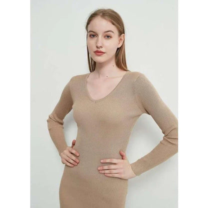 A chic and elegant knitted midi dress in neutral tones, featuring a graceful V-neck, full-length sleeves, and a flattering body-hugging silhouette.