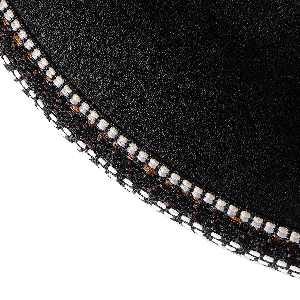 A black punk-style top hat with an embossed skull design, made of premium PU leather.