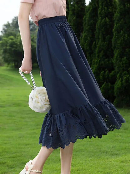 Elegant blue high-waisted A-line summer skirt with intricate lace patchwork details