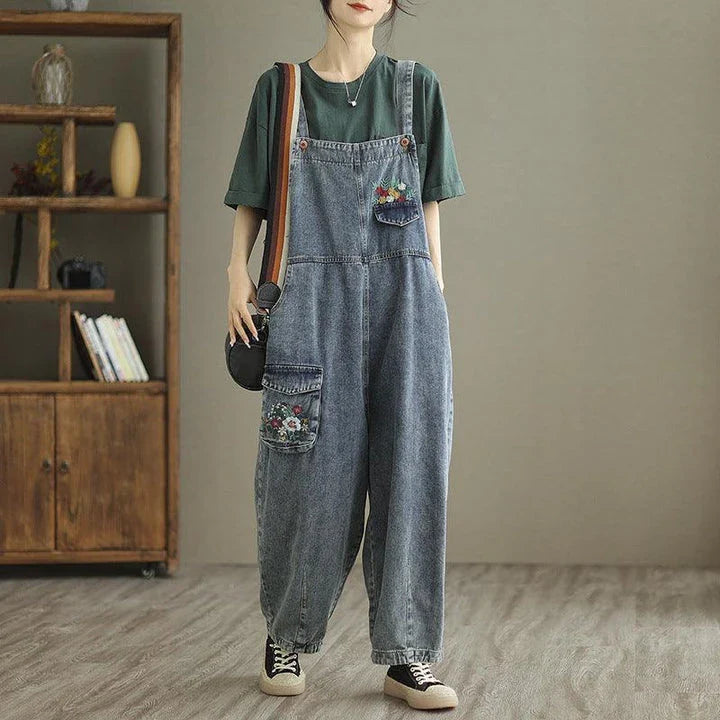 Trendy denim pants with embroidered straps for women, available in light blue color and various sizes from M to XXL