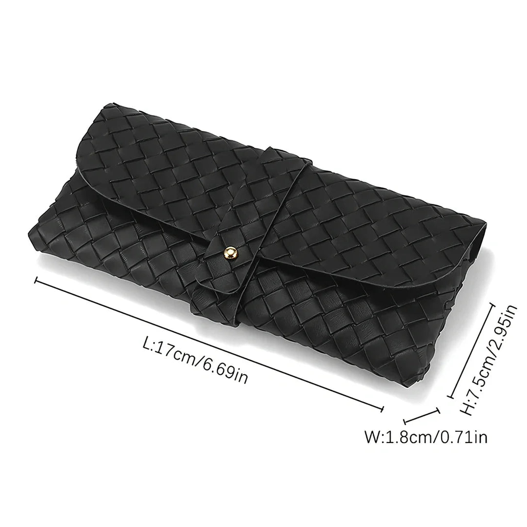 Stylish black and white twist braided leather sunglasses case with snap closure, protecting eyewear in a fashionable way