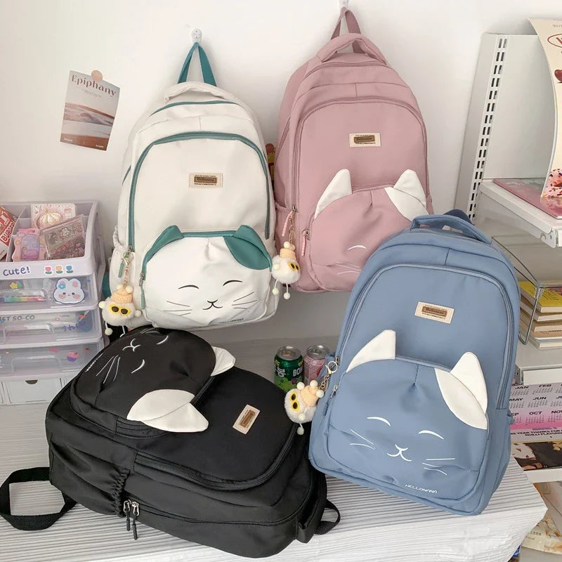 A stylish Japanese-inspired cat backpack with a large capacity, breathable nylon construction, and dedicated storage compartments for student essentials.