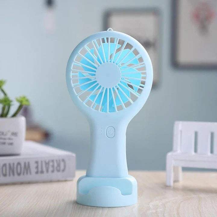 Compact USB-powered mini fan with adjustable speeds and quiet operation, ideal for home, office, and travel use