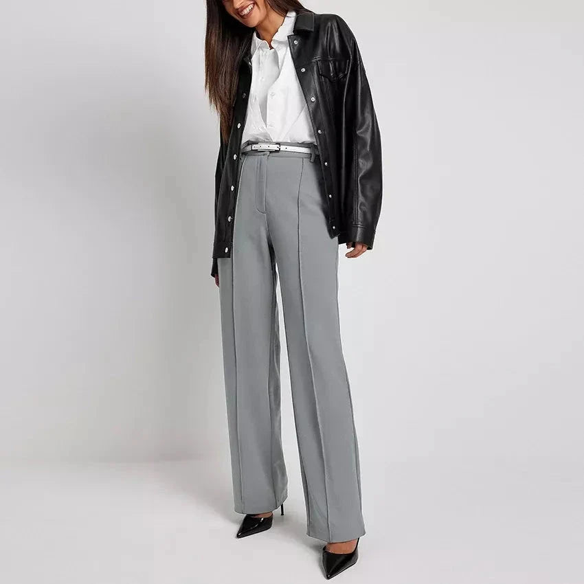 High waist pleated wide-leg trousers in a classic solid color, perfect for the modern Kiwi woman's wardrobe.