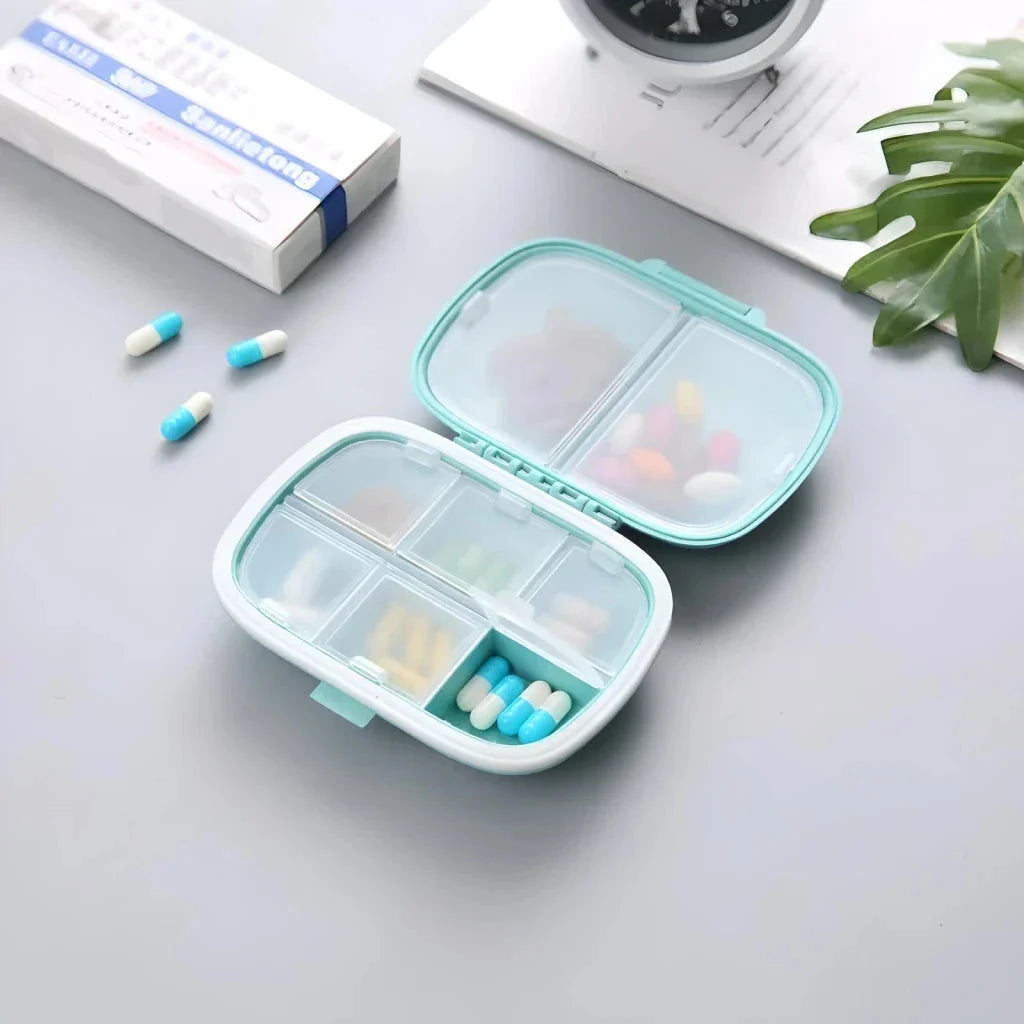 Compact and portable pill organiser with 8 compartments, perfect for Kiwi travellers to keep their daily vitamins and medications organised