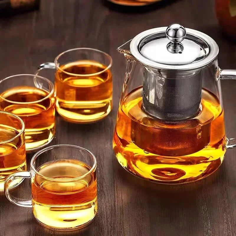 Elegant glass teapot set with stainless steel infuser, perfect for brewing and enjoying a variety of teas