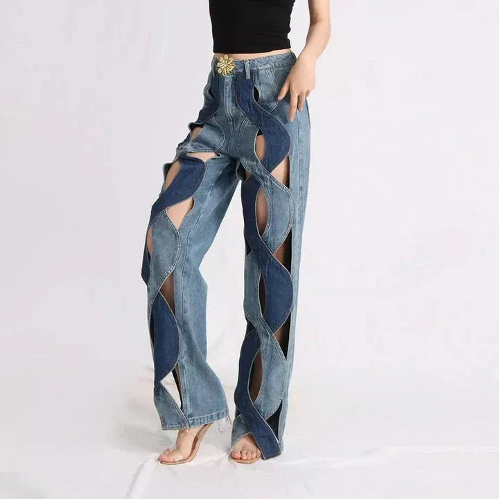 Stylish high-waist floral jeans with distressed detailing, perfect for the modern Kiwi woman's wardrobe.