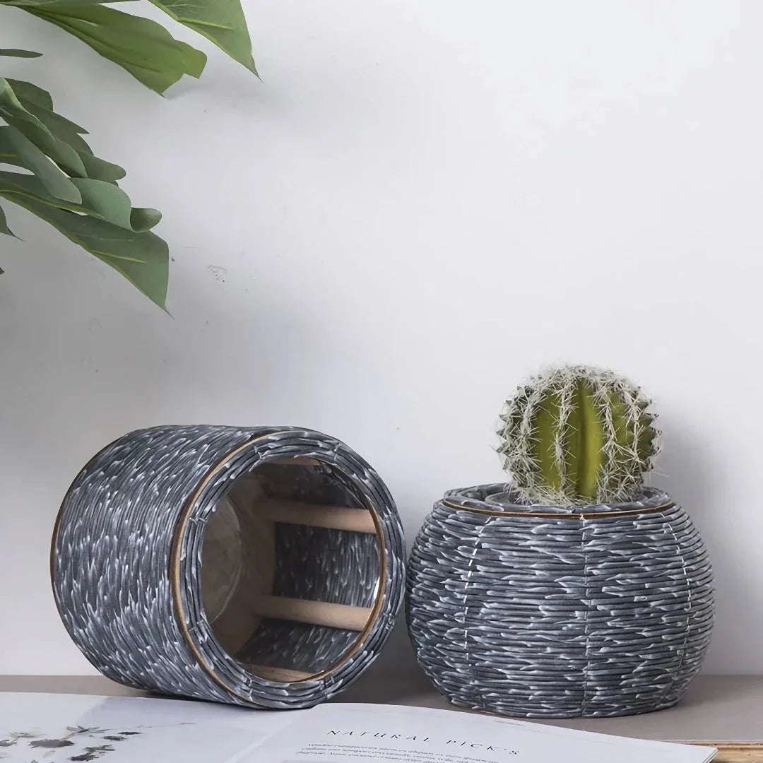 Hand-woven rattan planter with lush greenery, perfect for indoor and outdoor display