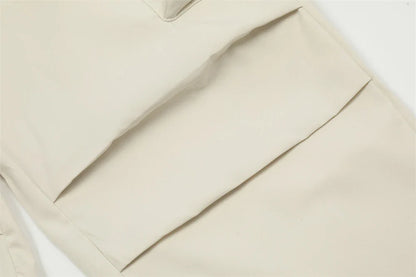 Stylish black overalls with pleated pockets, designed for the active Kiwi lifestyle