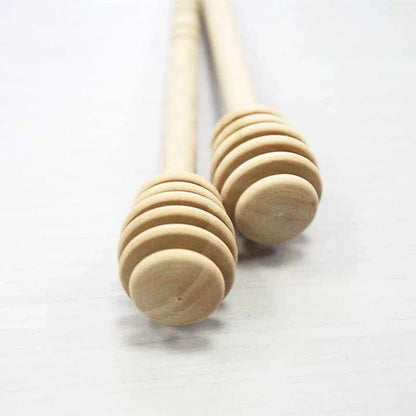 Elegant wooden honey spoon with a smooth, natural finish, perfect for drizzling, stirring, and serving in a Kiwi kitchen