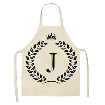 A crown and letter printed kitchen apron made of high-quality cotton and linen, suitable for both men and women in New Zealand kitchens.
