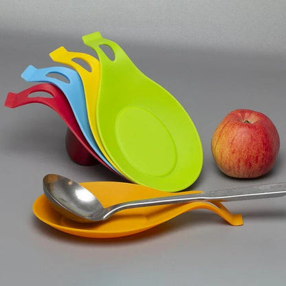 Heat-resistant silicone spoon mats in various vibrant colours, perfect for protecting Kiwi kitchen benchtops