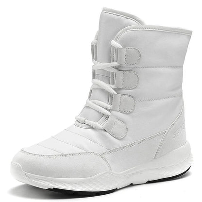 Plus size snow boots featuring plush fur lining, durable rubber sole and flattering round toe design for stylish winter wear