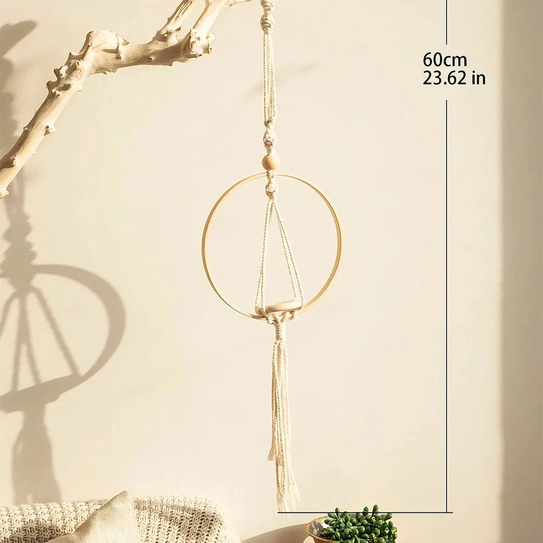 Beige macrame air plant hanging holder with intricate handwoven design, perfect for adding Boho-chic charm to any New Zealand home