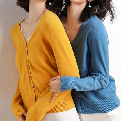 Stylish v-neck cardigan in various colors, featuring a flattering design and luxurious cashmere-rich composition for the modern Kiwi woman