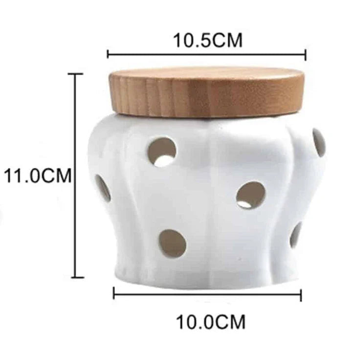 Stylish white ceramic garlic storage jar with wooden lid, designed for modern Kiwi kitchens