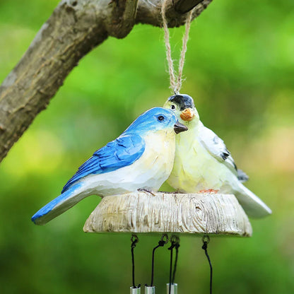 Charming wind chime featuring resin birds in vibrant Kiwi colours, swaying gently in the breeze and emitting a melodious sound.