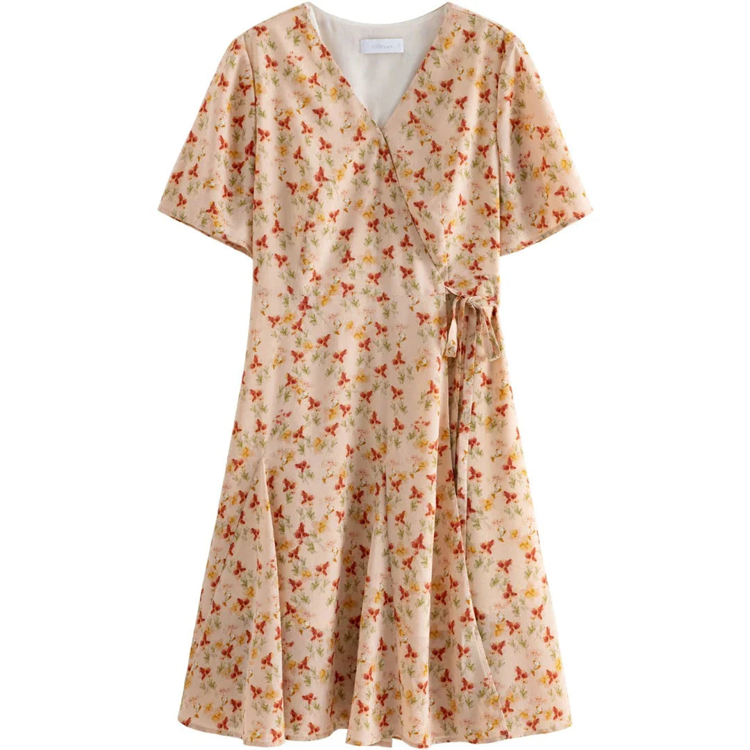 A stylish, high-waisted summer dress with a chic wrap design and playful dot pattern, perfect for Kiwi bohemian fashion.