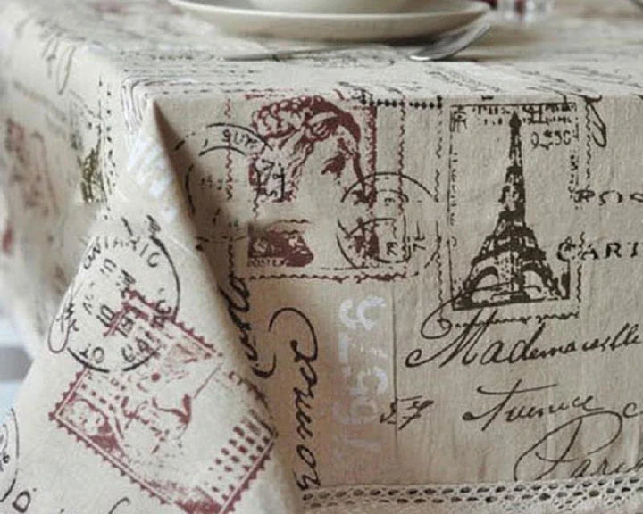 Elegant Paris-themed cotton and linen tablecloth with a delicate pattern, perfect for transforming your dining space