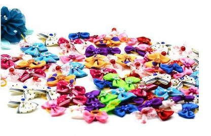 Flower Hair Bows for Dogs in a variety of vibrant colours, designed to add a playful, Kiwi-inspired touch to your canine companion's look.