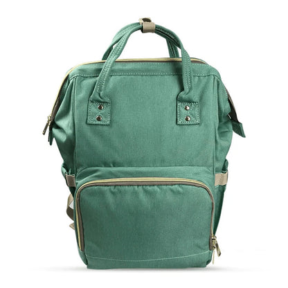 Stylish and practical mummy bag with reinforced handles, durable buckles, and separate bottling area for Kiwi mums