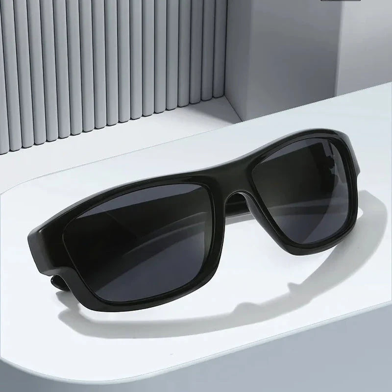 Cyberpunk-inspired square sunglasses with vibrant, reflective lenses and a durable polycarbonate frame