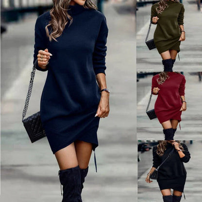 A stylish long sleeve dress with a high neck and an asymmetric skirt in a range of contemporary colours