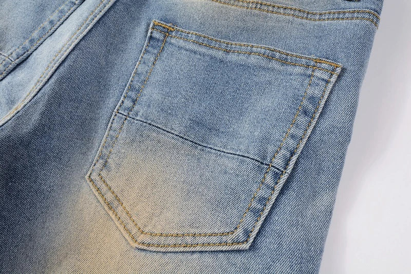 Vintage-inspired jeans with rhinestone and ink splash detailing, perfect for the modern Kiwi lifestyle