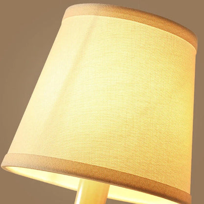 Elegant copper wall lamp with a luxurious fabric shade, providing warm and ambient lighting for Kiwi homes